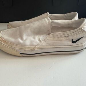 Nike Cream Slip-On Sneakers with Black Logo